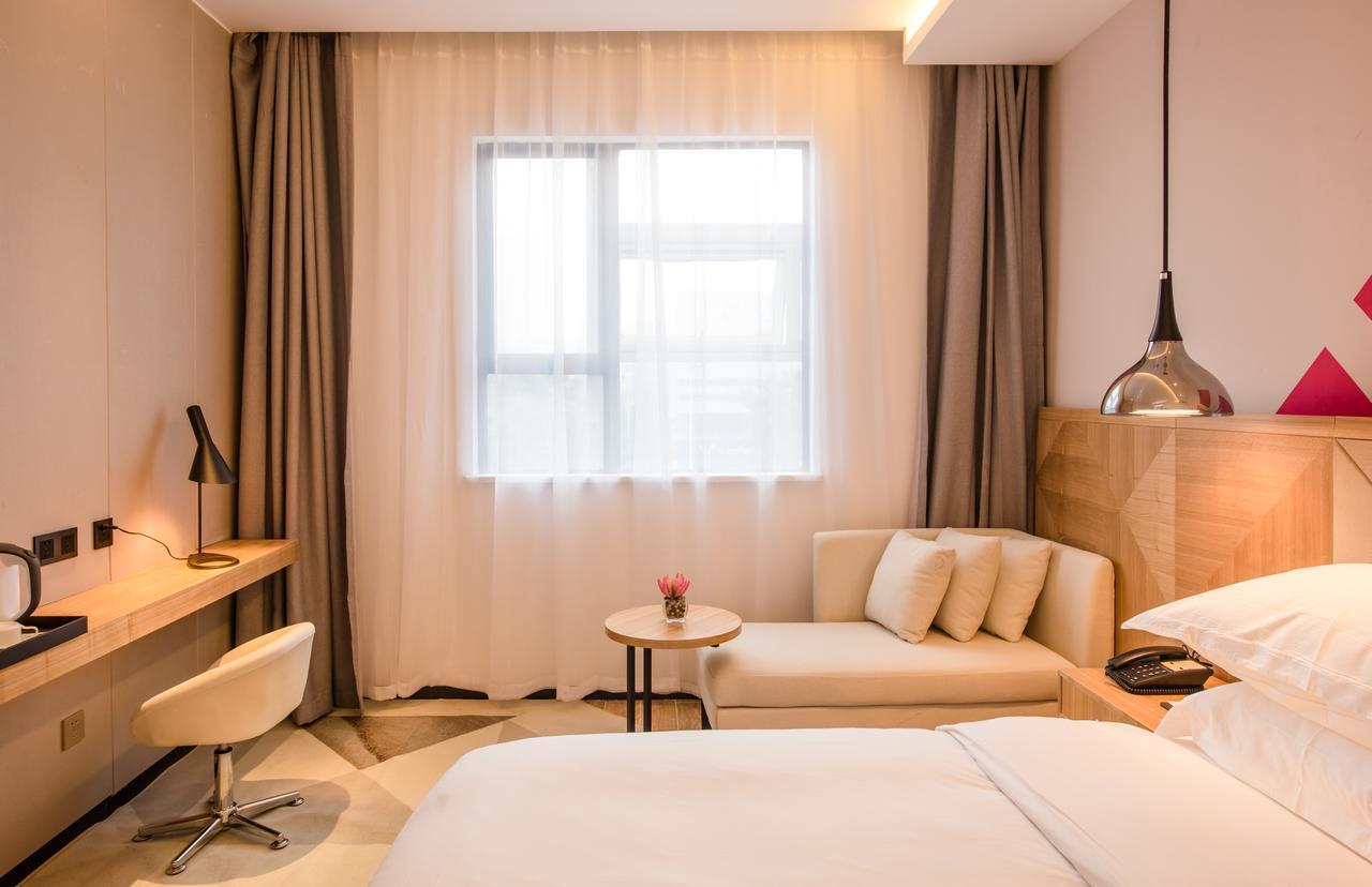 Borrman Hotel Guangzhou Tianhe Sports Center Екстер'єр фото